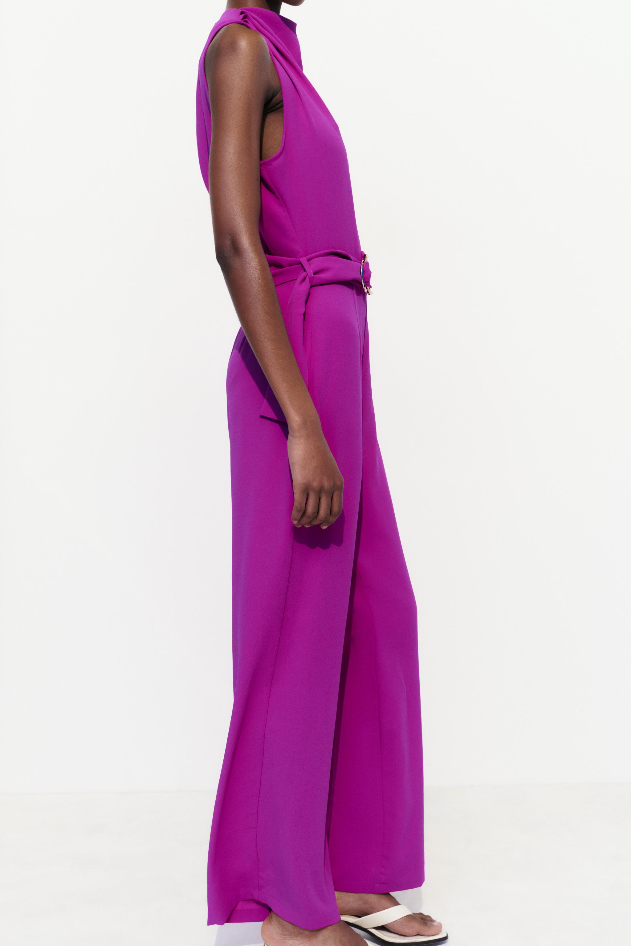 ASYMMETRIC JUMPSUIT WITH BELT