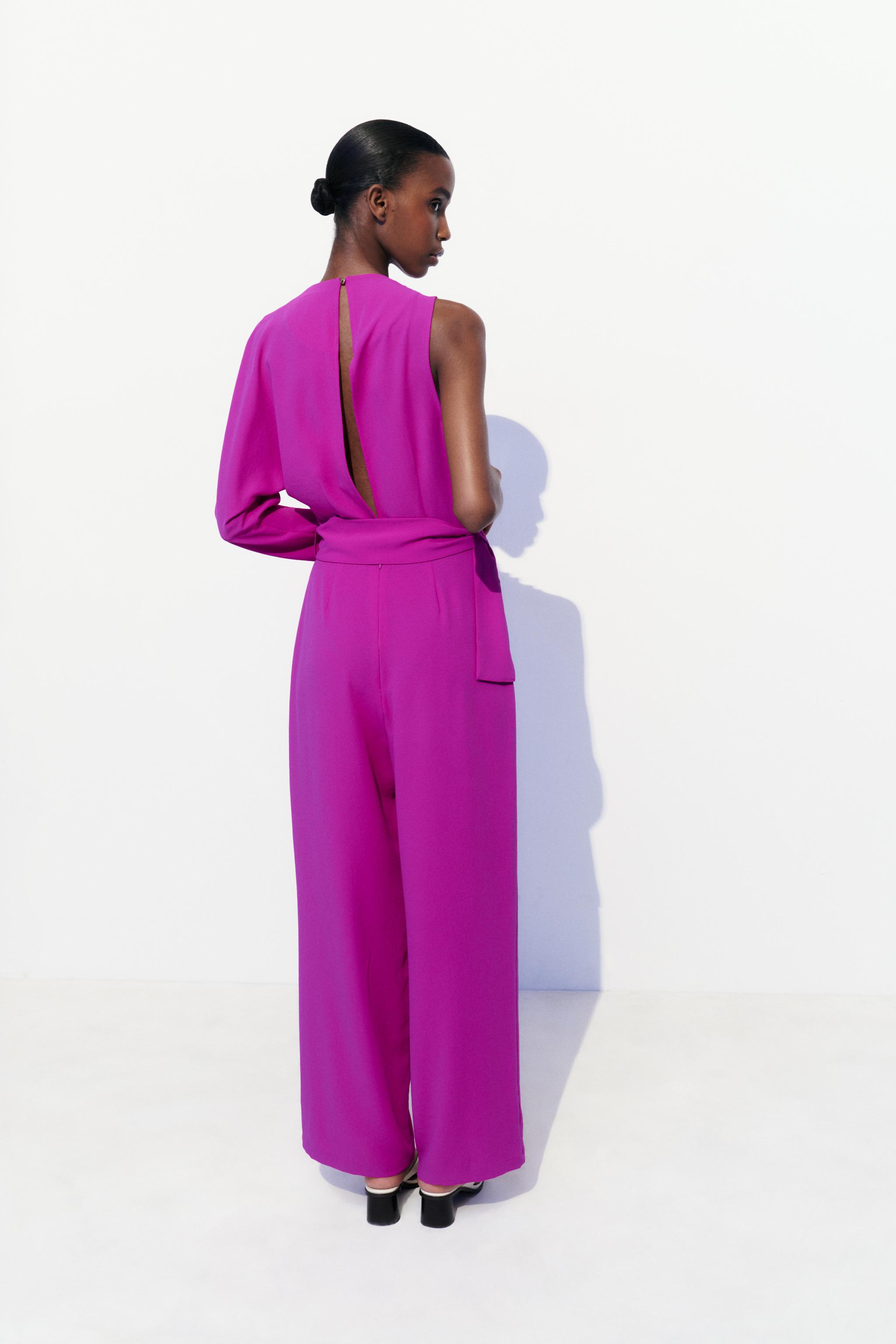 ASYMMETRIC JUMPSUIT WITH BELT