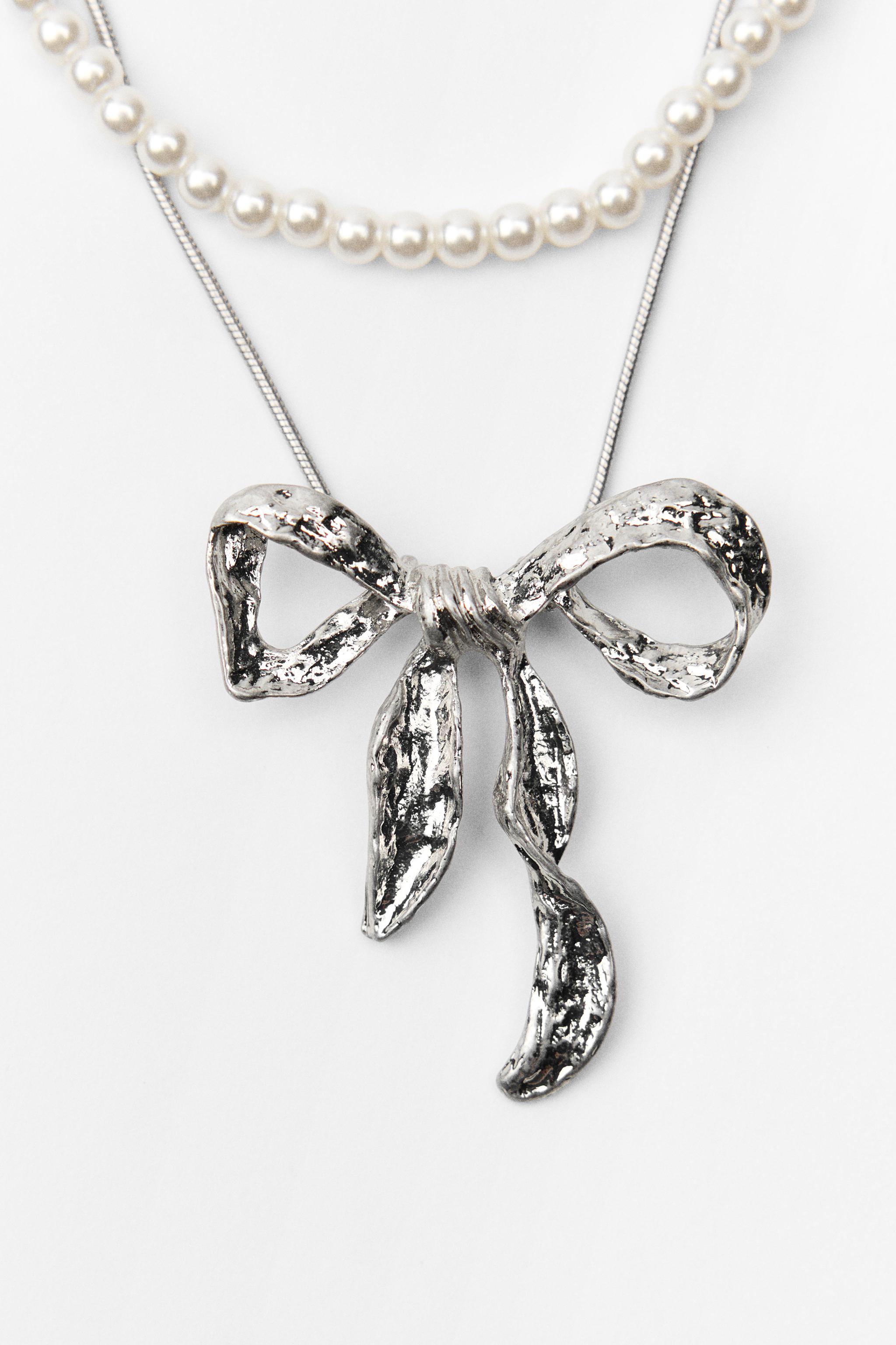 PACK OF PEARL BEAD AND BOW NECKLACES