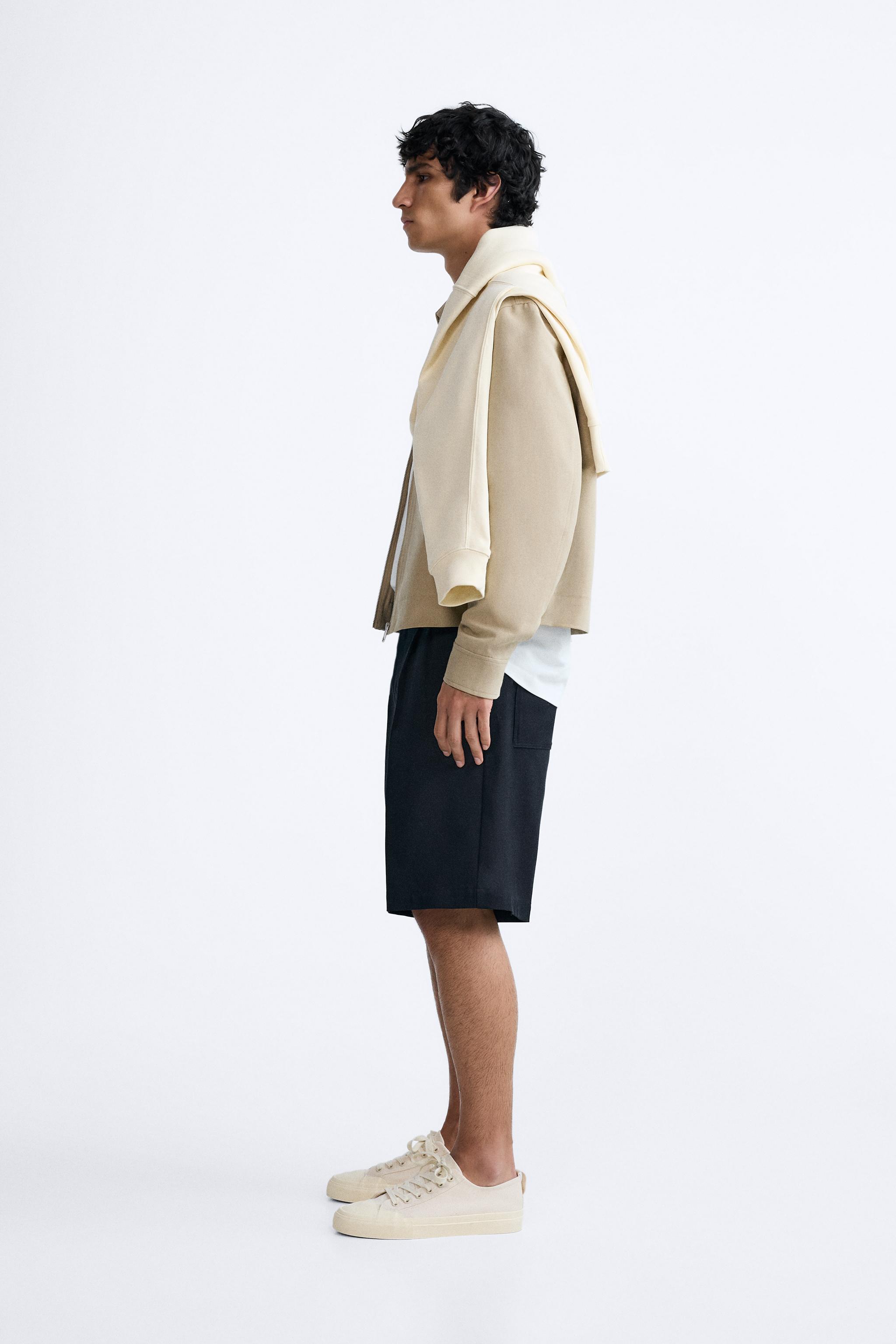 TEXTURED BERMUDA SHORTS WITH PLEATS