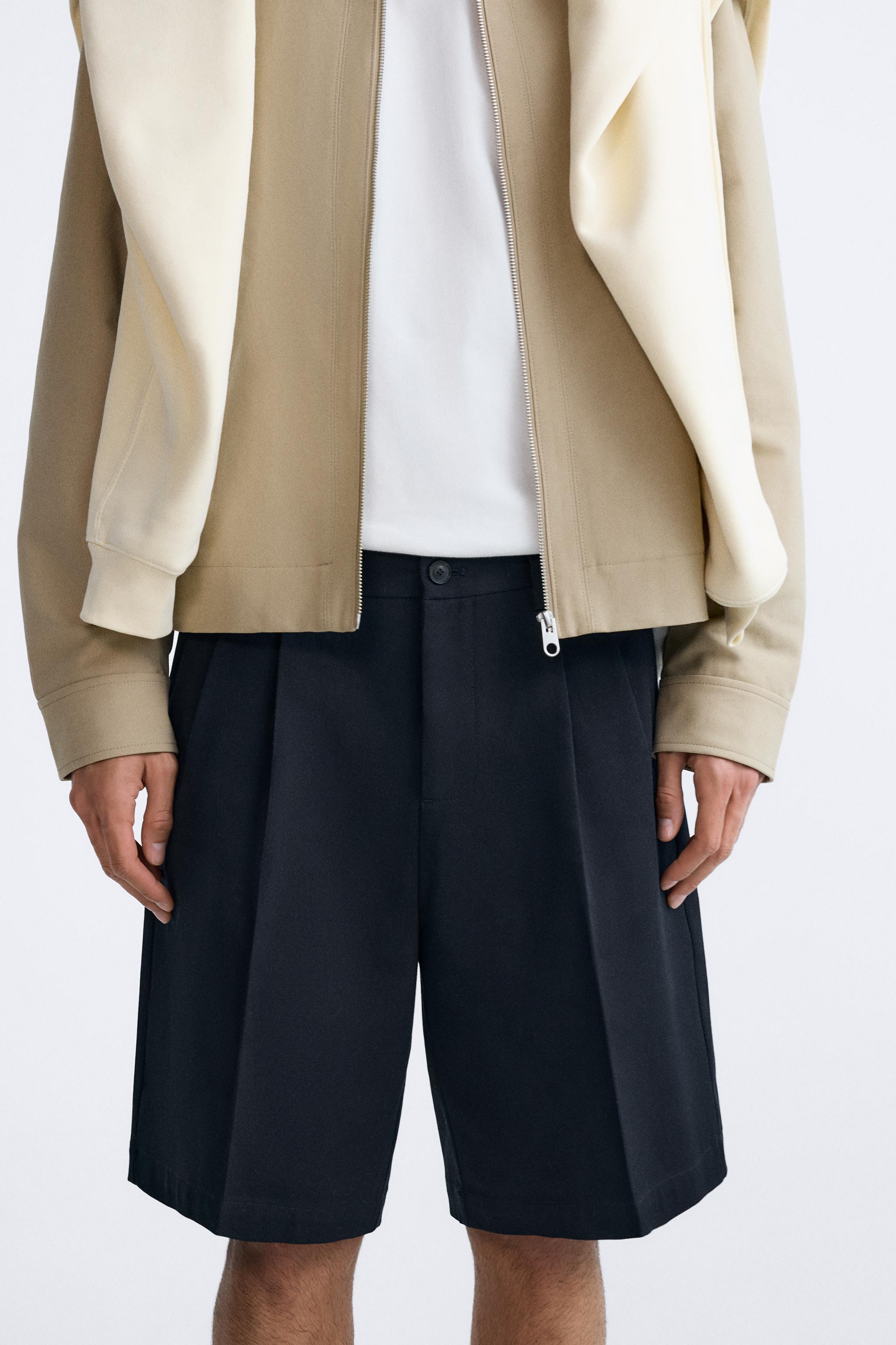 TEXTURED BERMUDA SHORTS WITH PLEATS